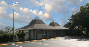 A row of buildings with a sky background